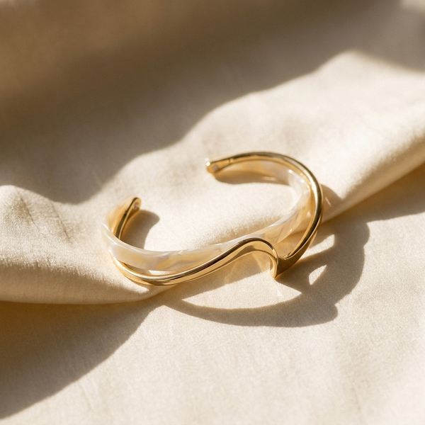 Maison Osonn bracelets on cream silk