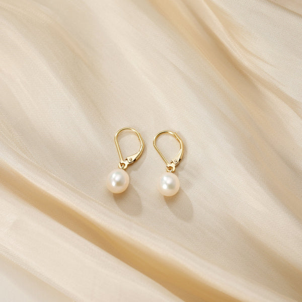 Pearl Gold Dangle Earrings — image 1