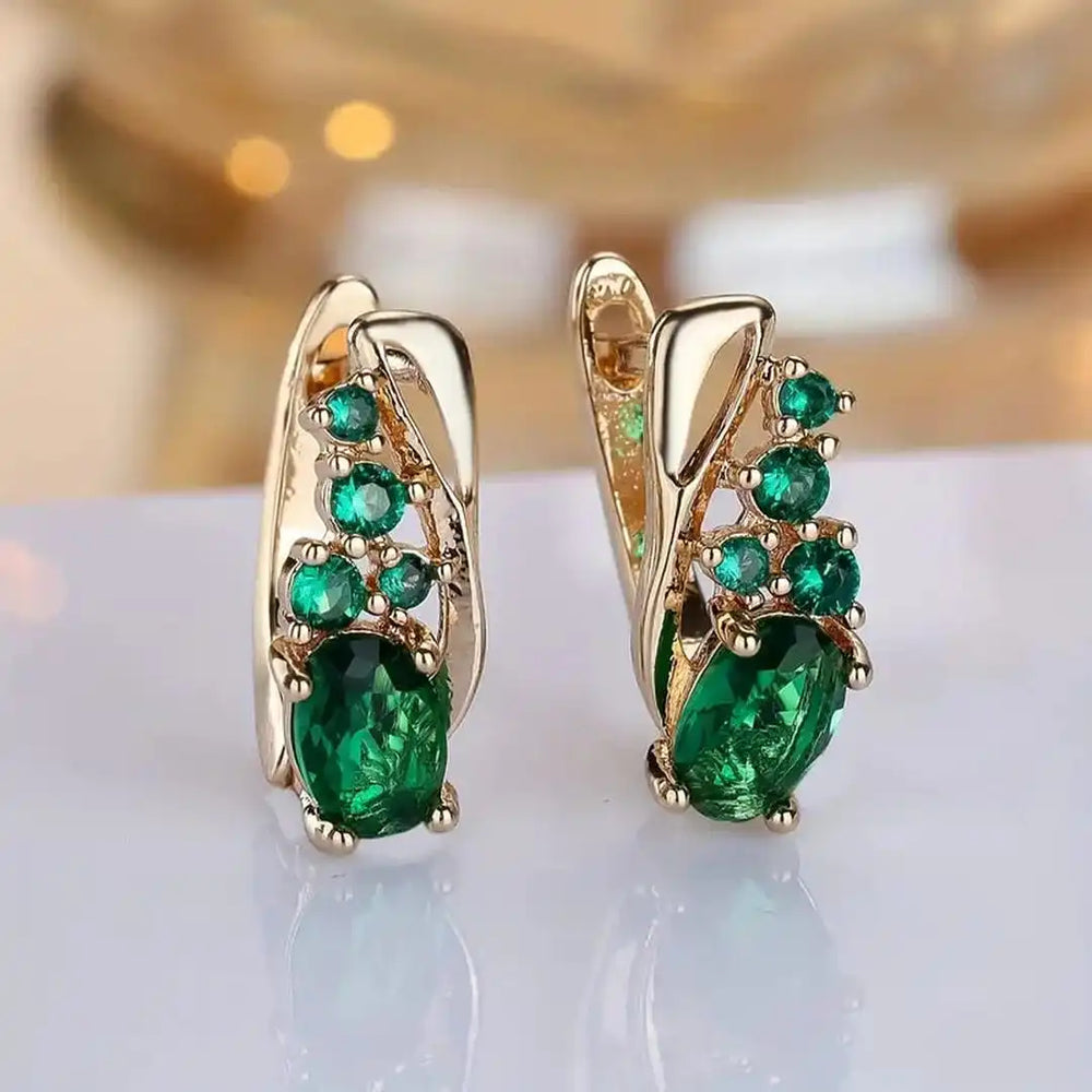 Emerald Gold Dangle Earrings — image 1