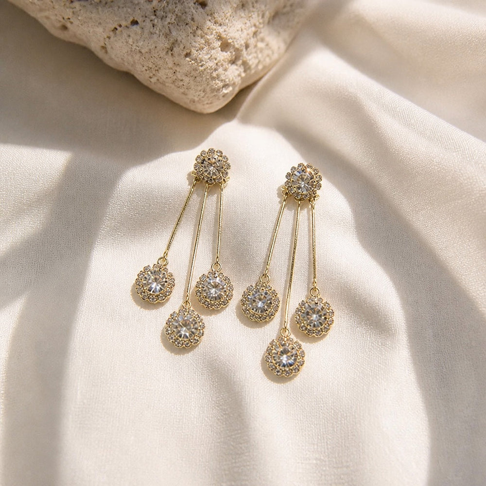 Tertia Honoria Shimmering Earrings — image 1
