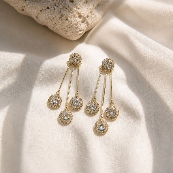 Tertia Honoria Shimmering Earrings — image 1