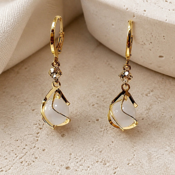 Opal Golden Dangling Earrings — image 1
