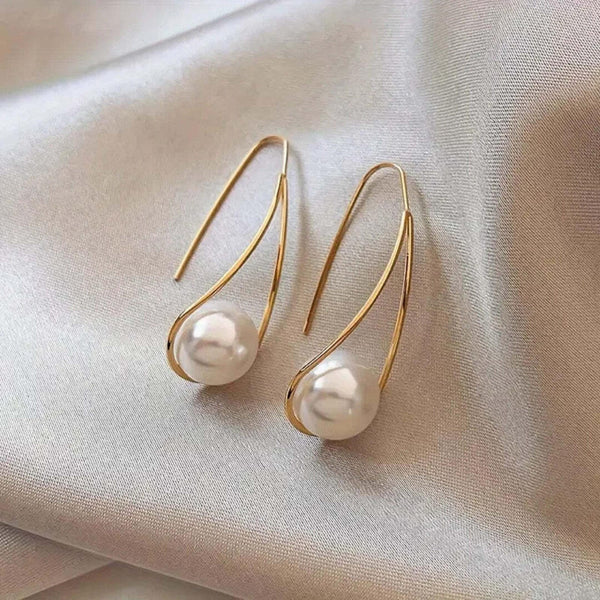 Elegant Pearl Dangling Earrings — image 1