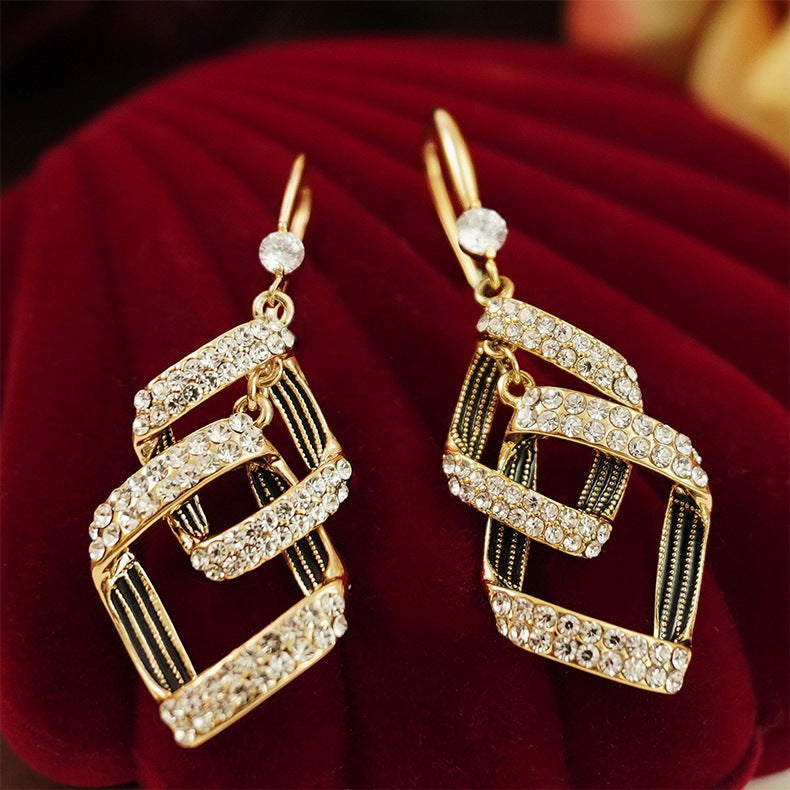 Stella Virelle Layered Gold Earrings — image 1