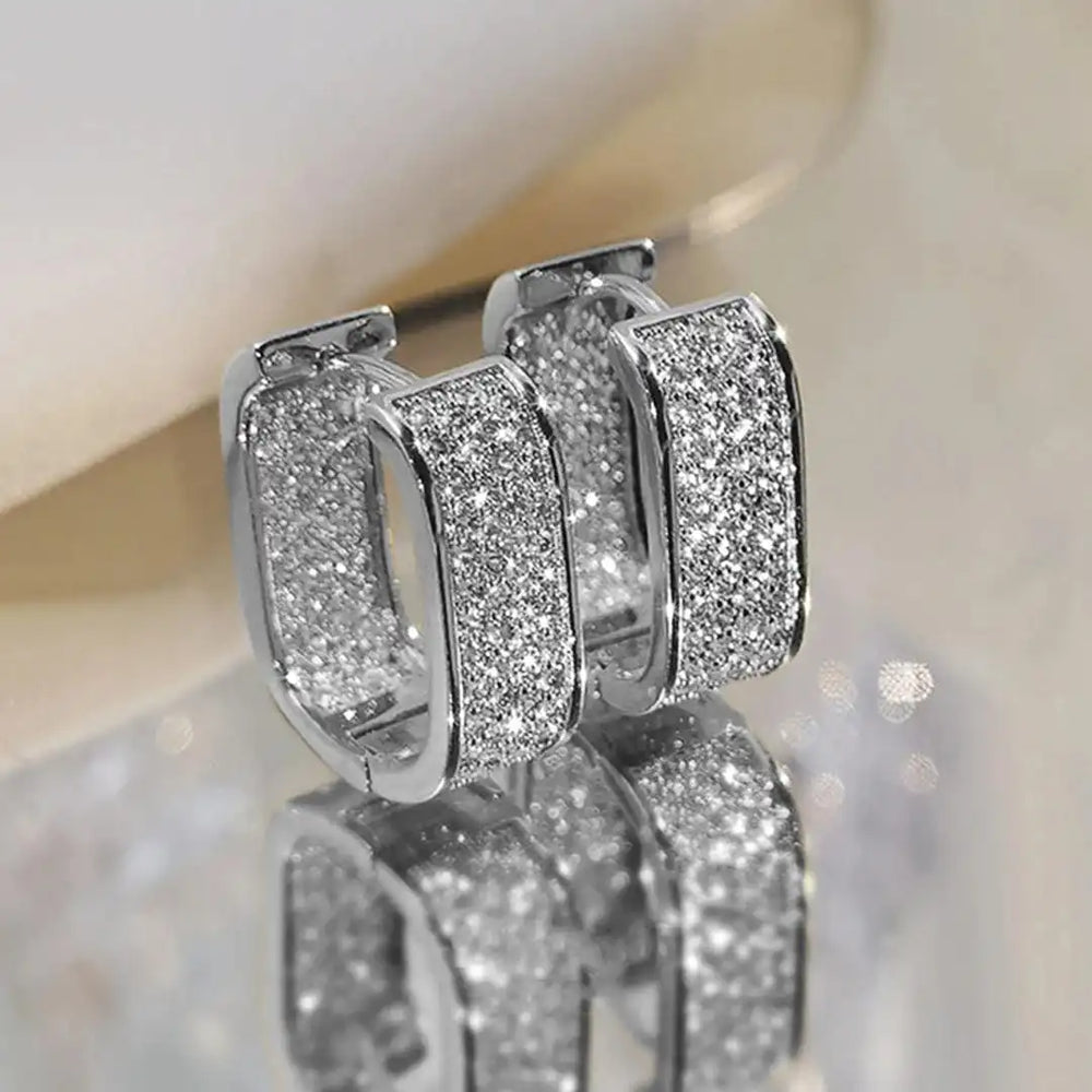 Pavelina Huggie Hoop Earrings — image 2
