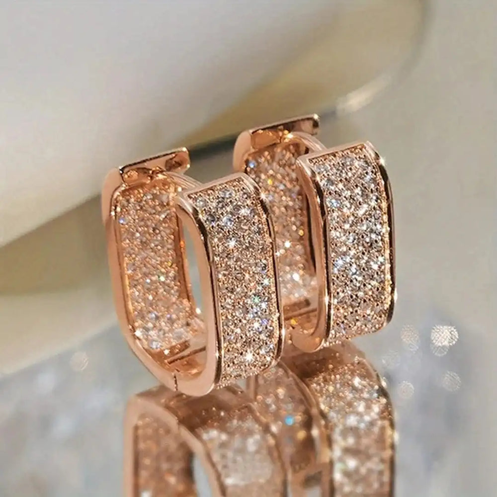 Pavelina Huggie Hoop Earrings — image 3