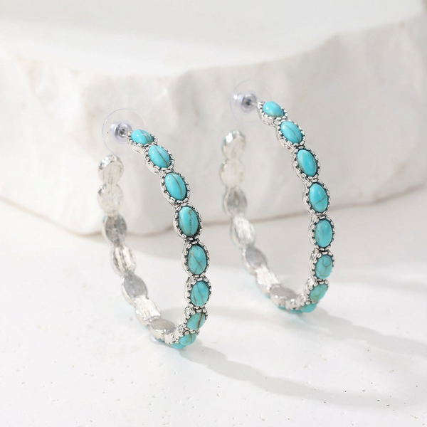 Oval White Gold Hoop Earrings — image 1