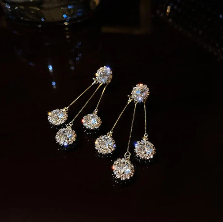 Tertia Honoria Shimmering Earrings — image 2