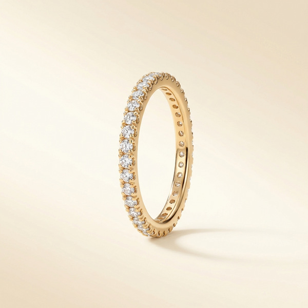 Aurélie Signature Pavé Ring — slim gold-tone band set all around with brilliant-cut pavé stones