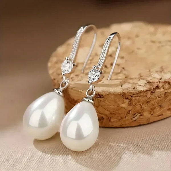 Dangling Earrings with Bright Pearls — image 1