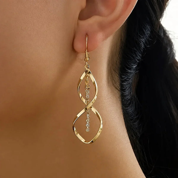 Sunbeam Spiral Gold Earrings — image 1