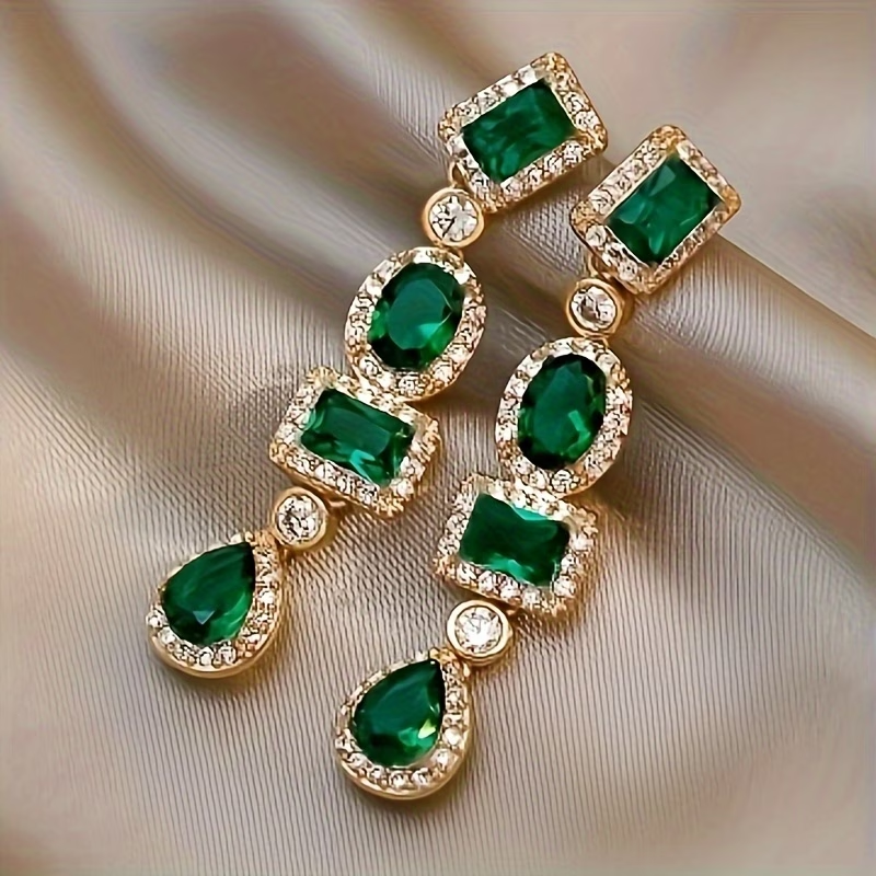 Dangling Emerald Gold Earrings — image 2
