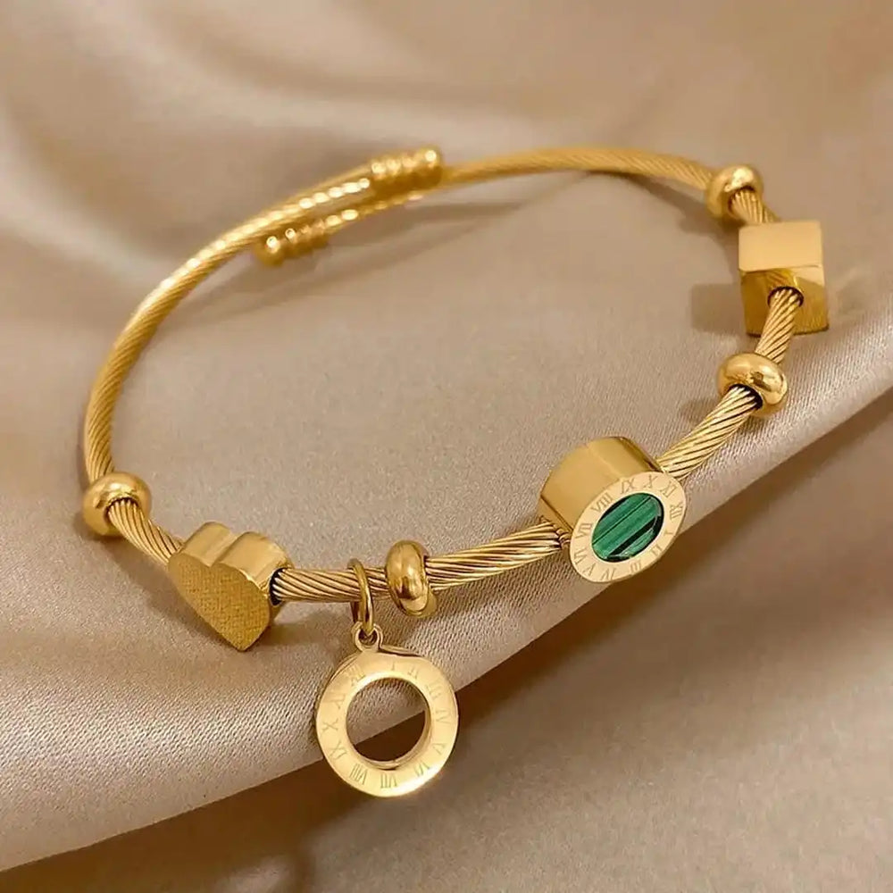 Gold Emerald Charm Bracelet — image 1