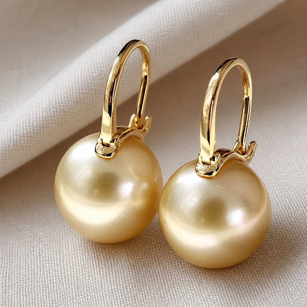 Radiant Golden Pearl Earrings — image 1