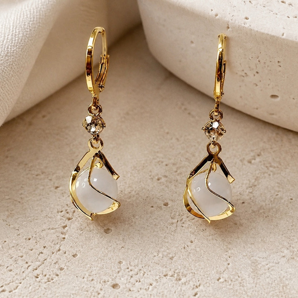 Opal Golden Dangling Earrings — image 1