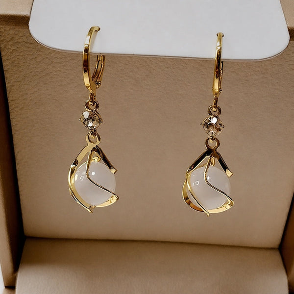 White Opal Dangling Golden Earrings — image 1