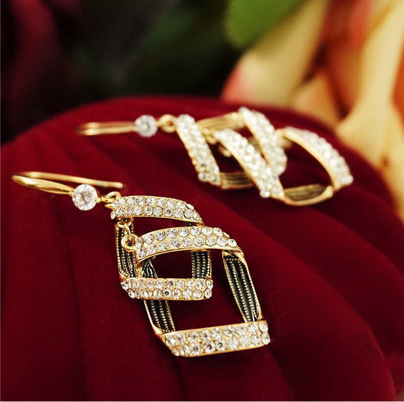 Stella Virelle Layered Gold Earrings — image 2