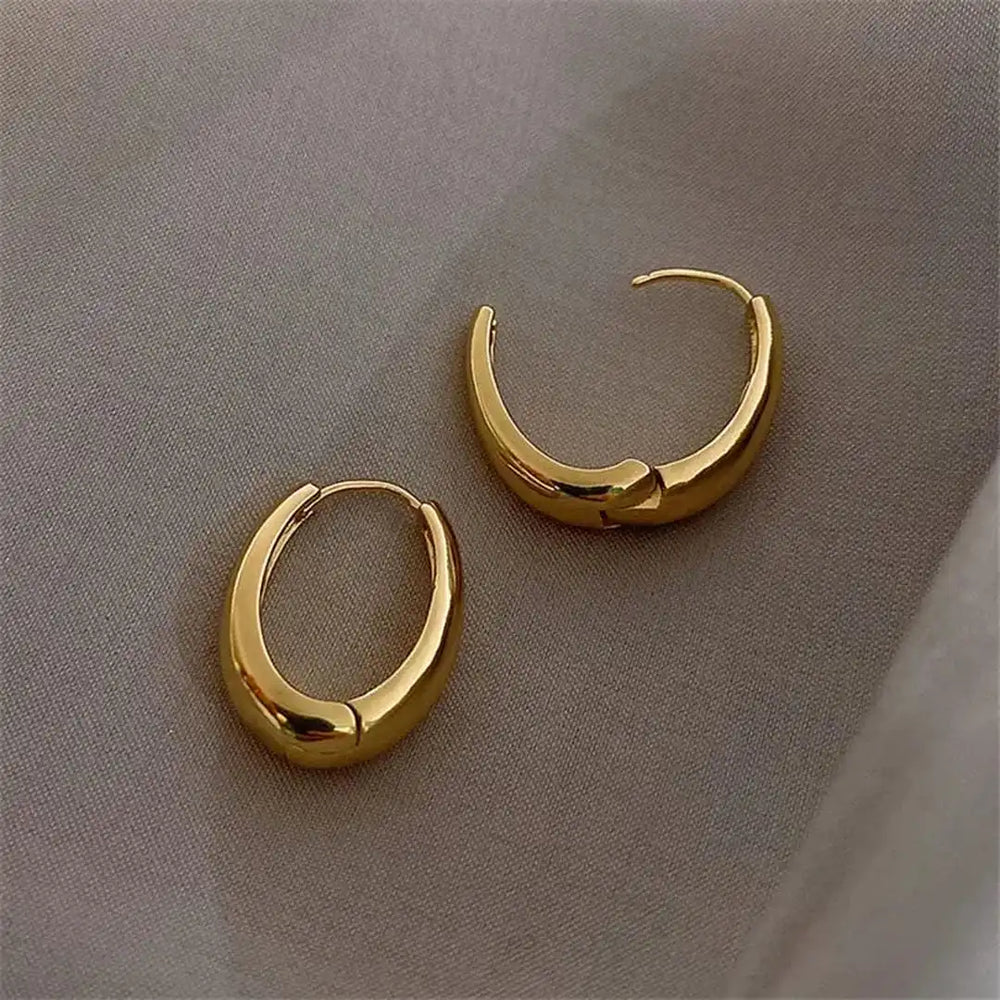 Classic Golden Hoop Earrings — image 3