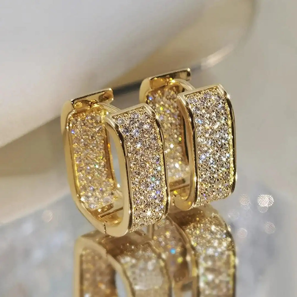 Pavelina Huggie Hoop Earrings — image 1