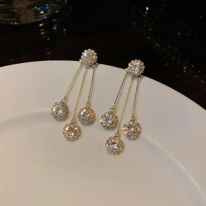 Tertia Honoria Shimmering Earrings — image 1