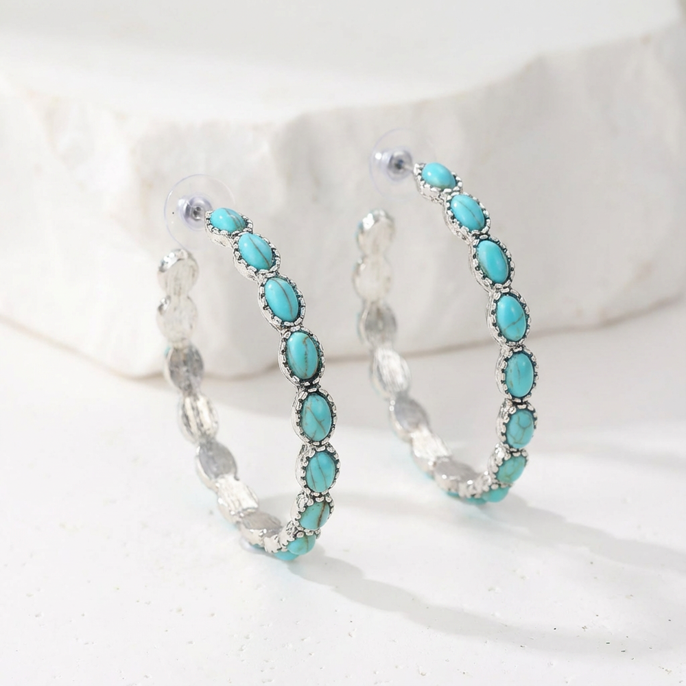 Oval White Gold Hoop Earrings — image 1