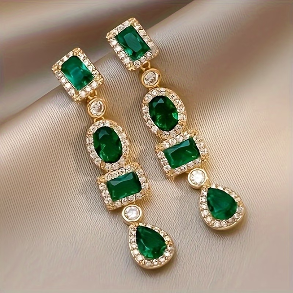 Dangling Emerald Gold Earrings — image 1