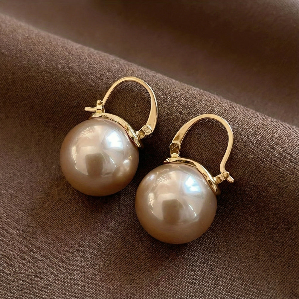 Elegant Pearl Dangle Earrings — image 1