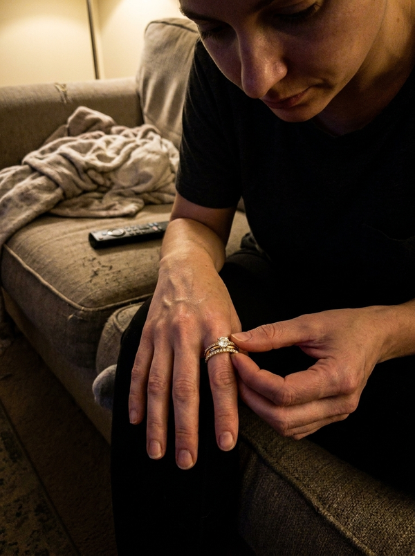 Maison Osonn Célestine Radiance Stacked Ring worn on a hand, seen on a sofa