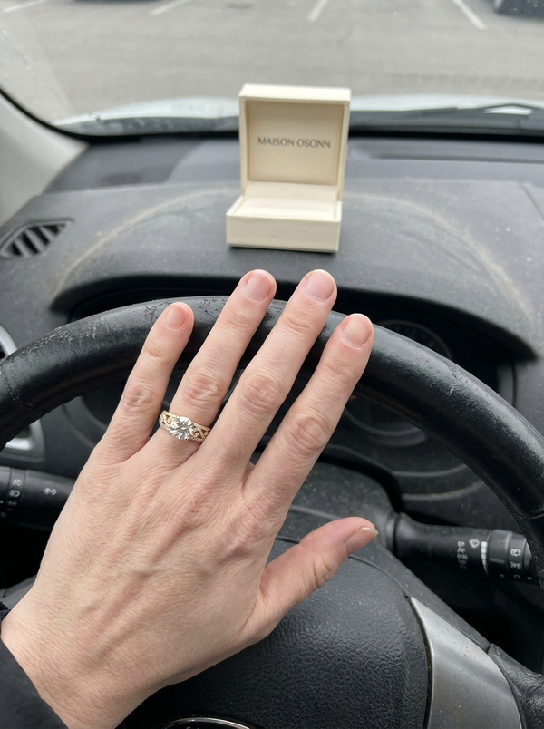 Maison Osonn Héritage Sculpted Ring worn on a hand on a steering wheel