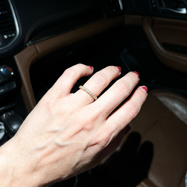 Maison Osonn Aurélie Signature Pavé Ring worn on a hand photographed in a car